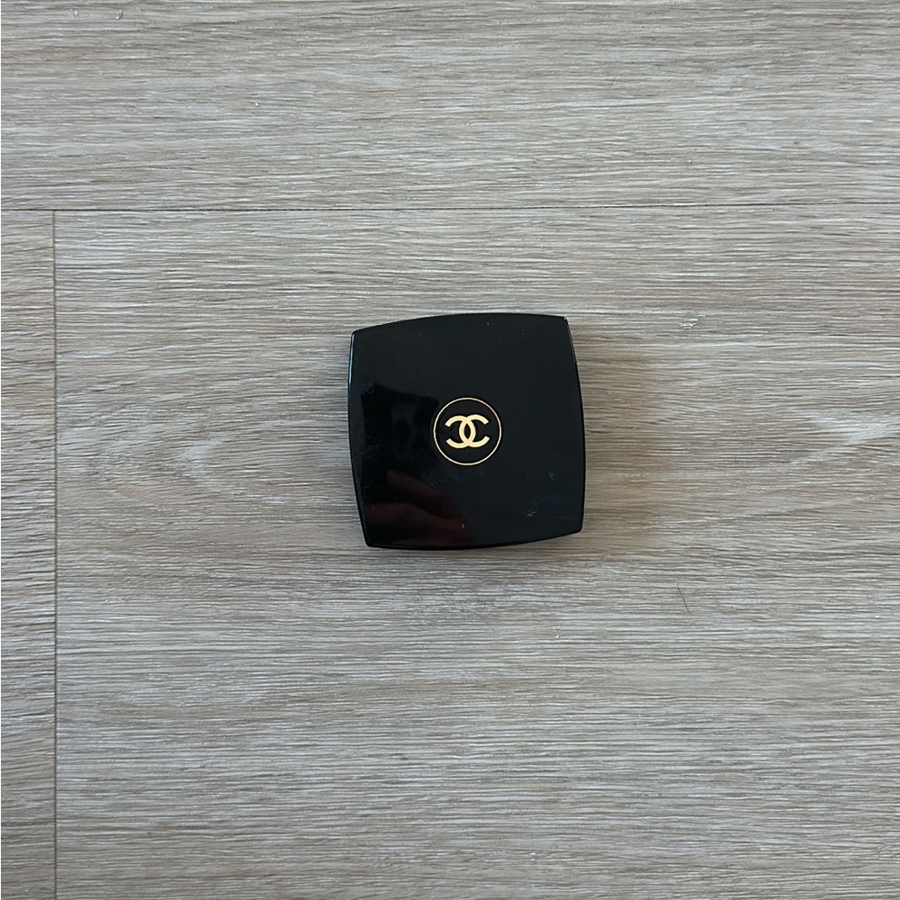 CHANEL Glossy Black Compact with Gold Emblem